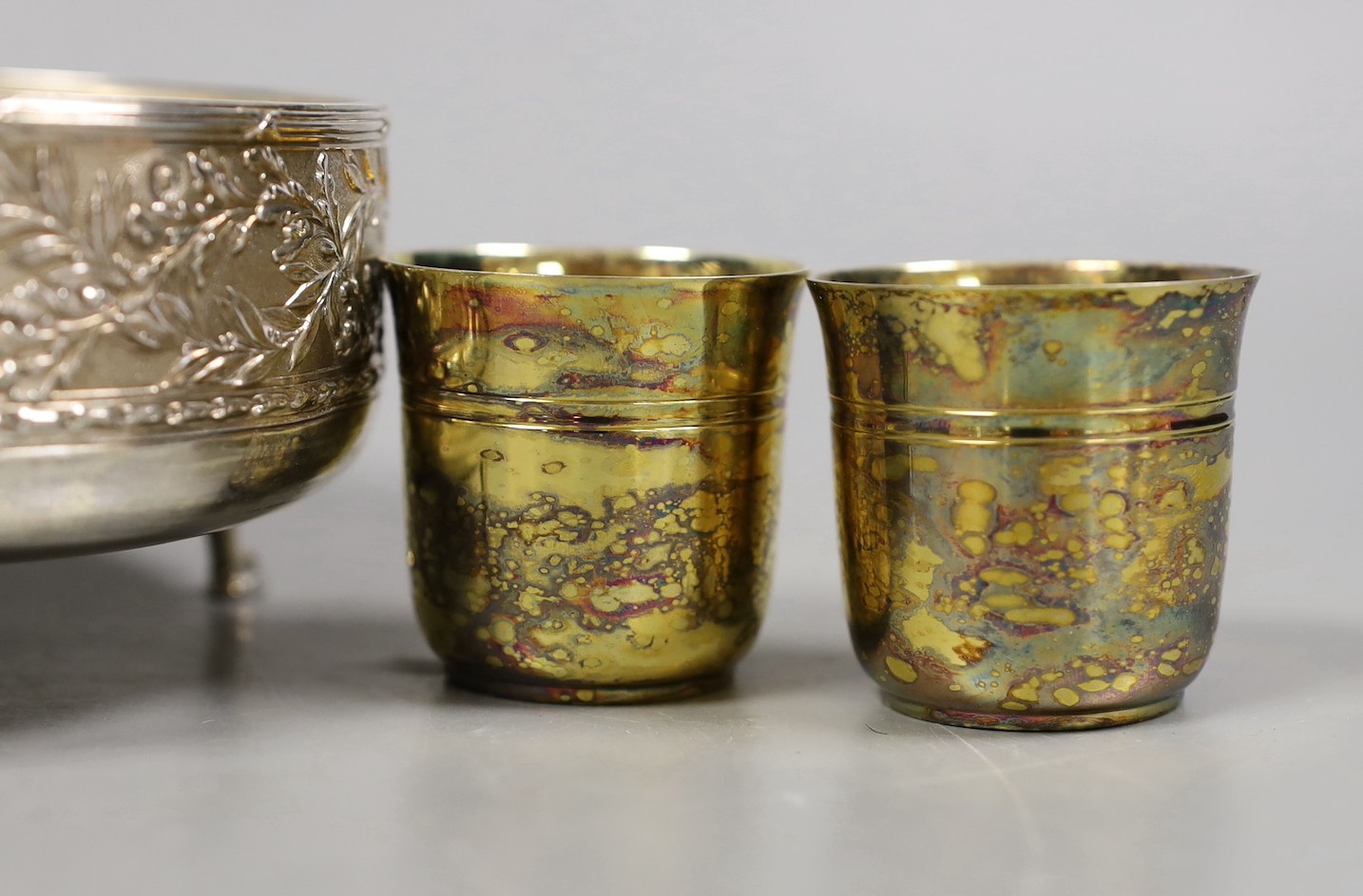 Eight assorted French white metal items including pair of gilded beakers on stands, by Puiforcat, Paris, a bowl by Armand Gross and three barrel shaped cups, by Fizaine, 12.9oz.